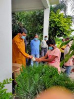 Distribution Of Food Grain And Sanitizer